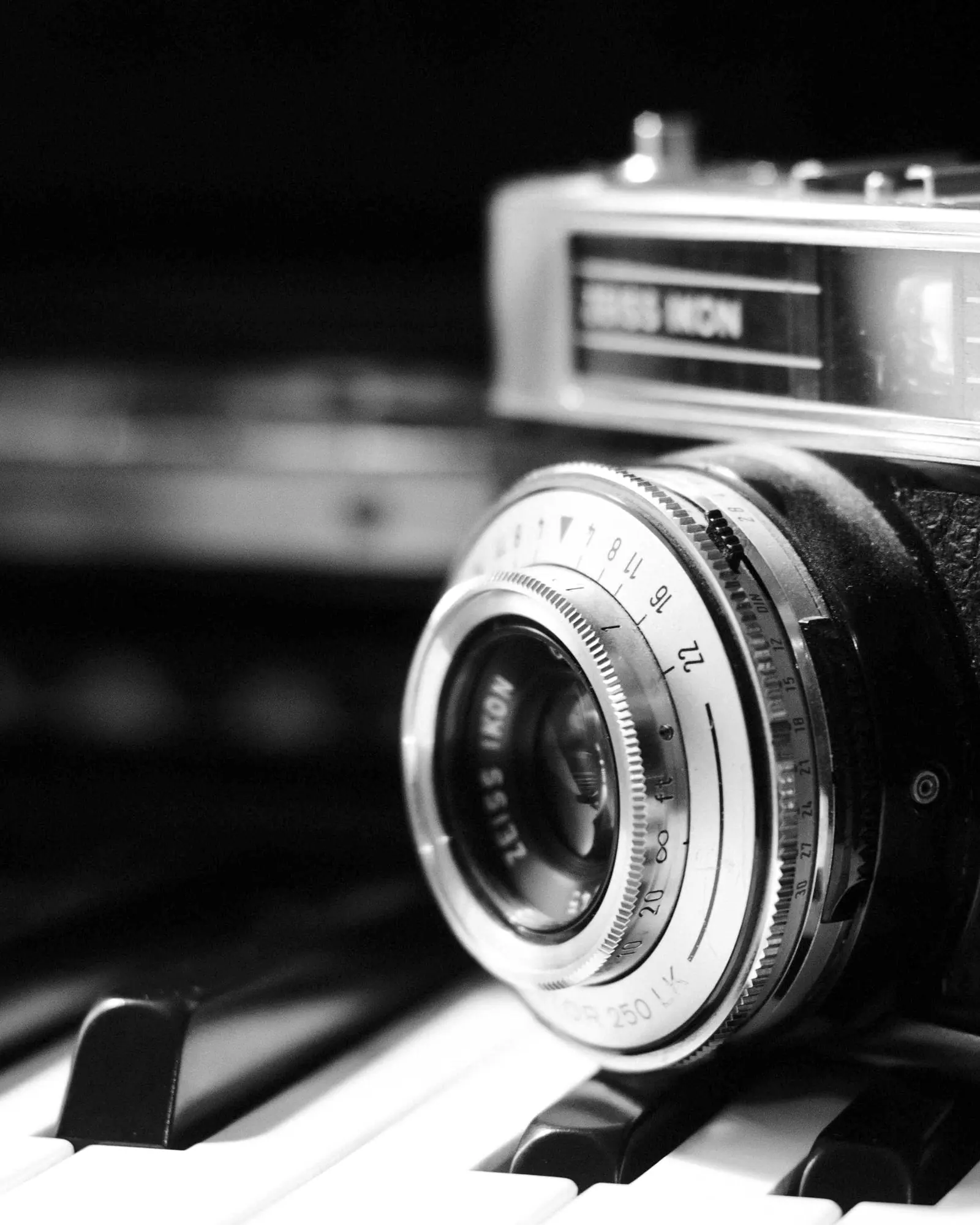 A film camera on a dark ground