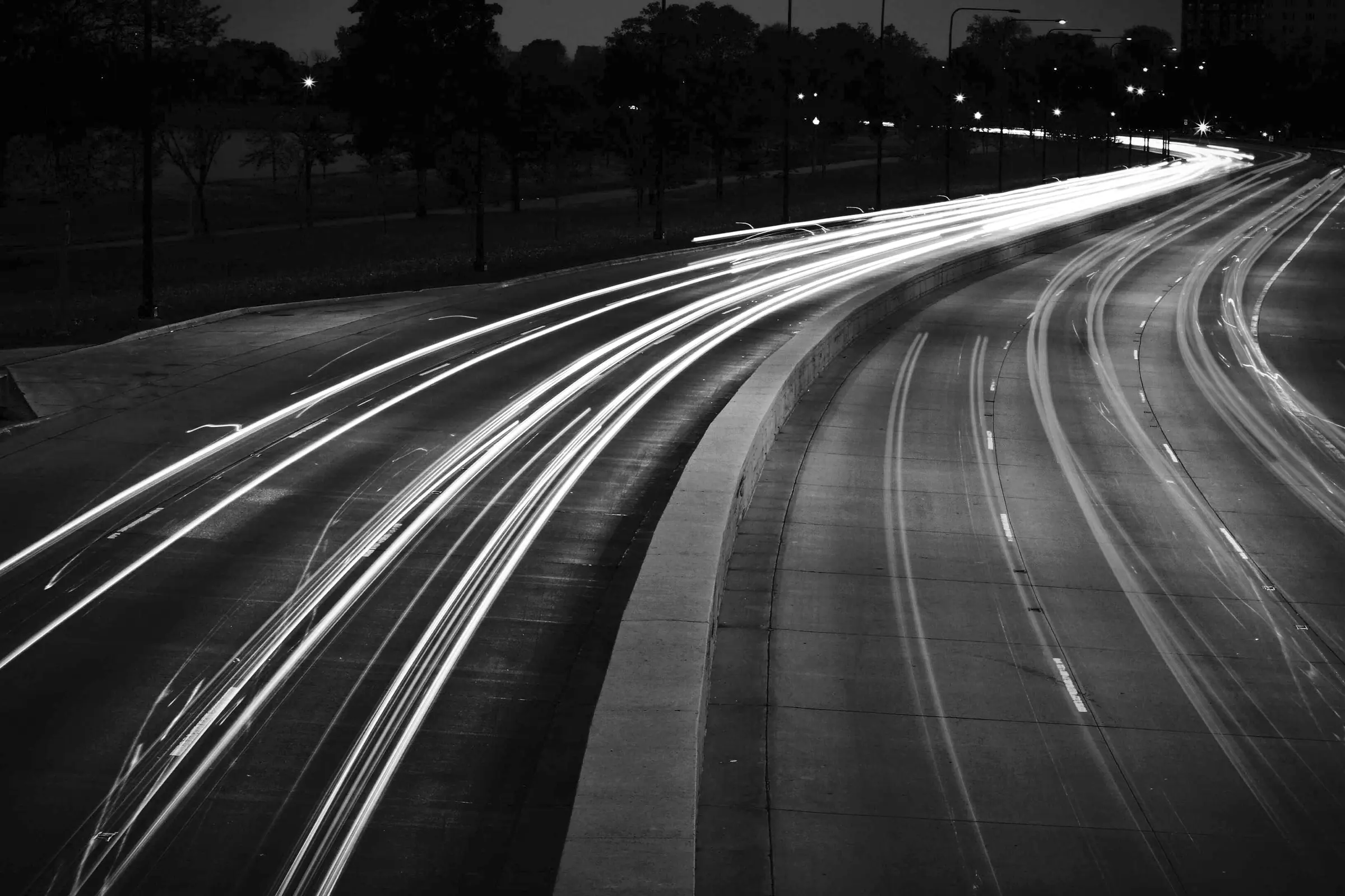 Light trails on a curving road